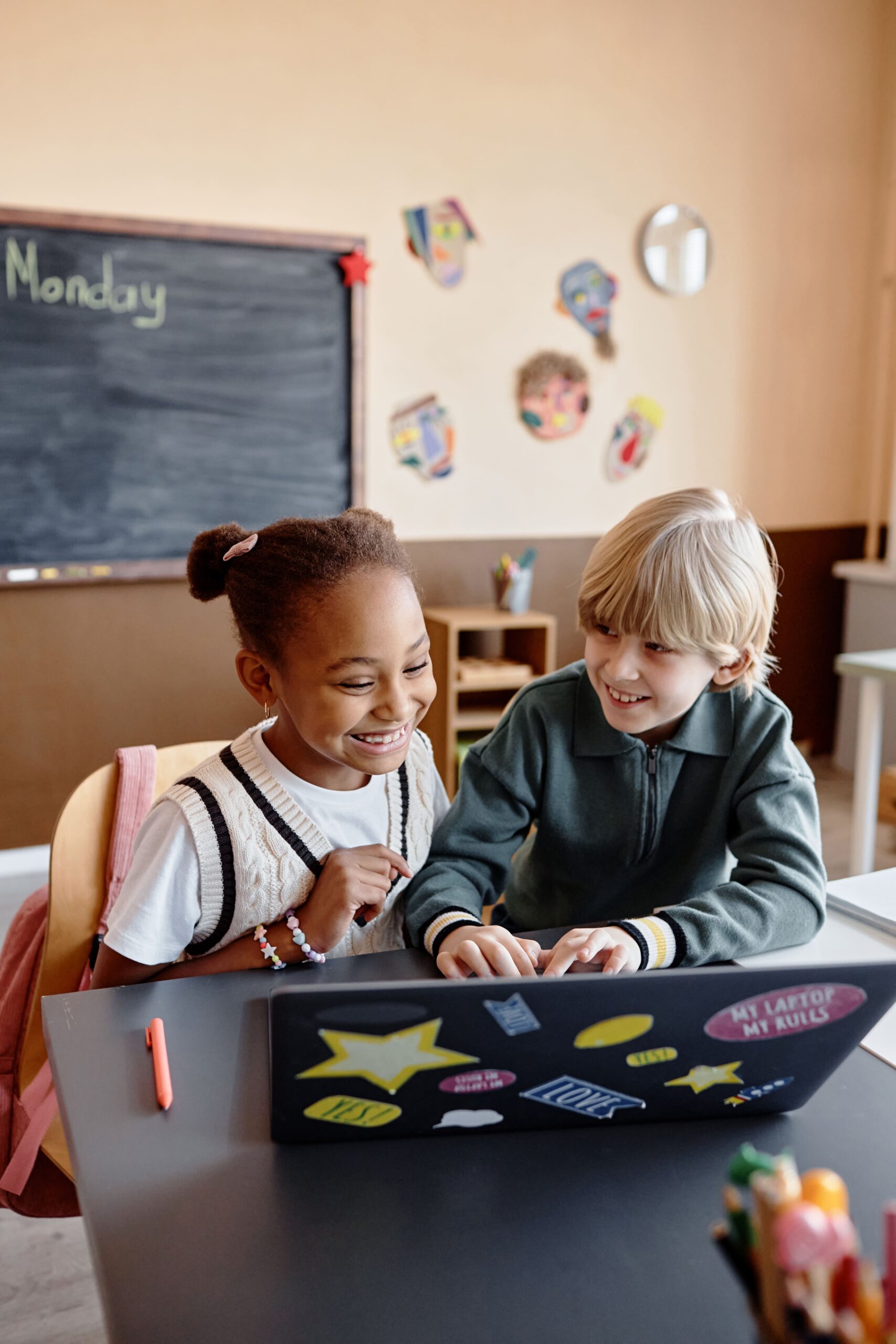 happy elementary school kids sharing computer in l 2025 03 10 07 55 47 utc min scaled